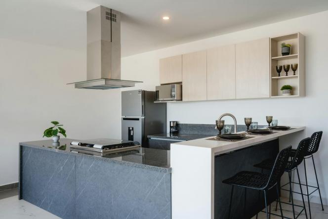 Condos in 5 M-RC5 BLVD. CIRCUITO COSTERO  