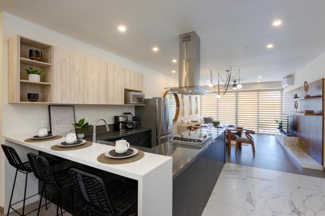 Condos in 5 M-RC5 BLVD. CIRCUITO COSTERO  