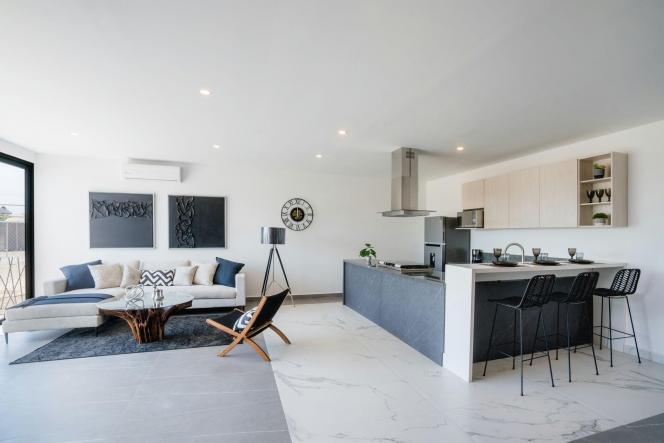 Condos in 5 M-RC5 BLVD. CIRCUITO COSTERO  